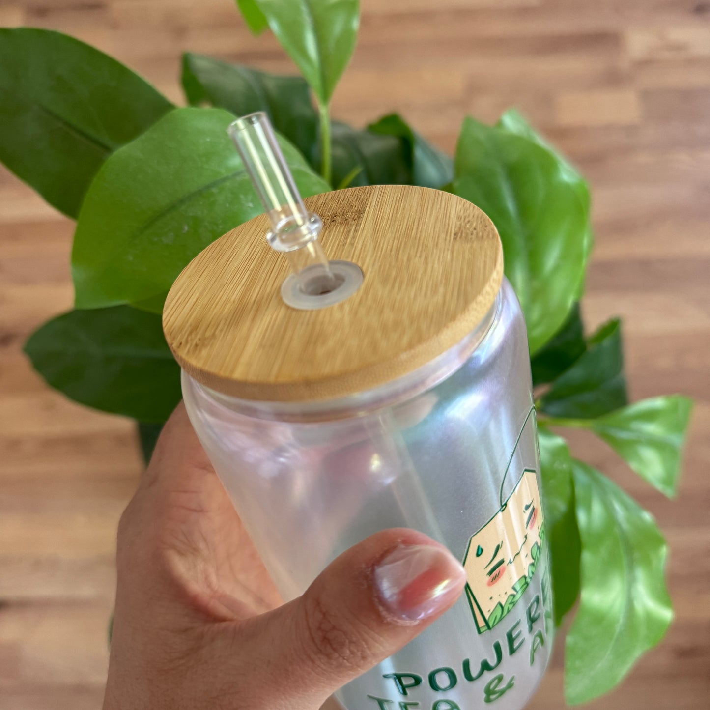 Powered by tea glass with bamboo lid and straw